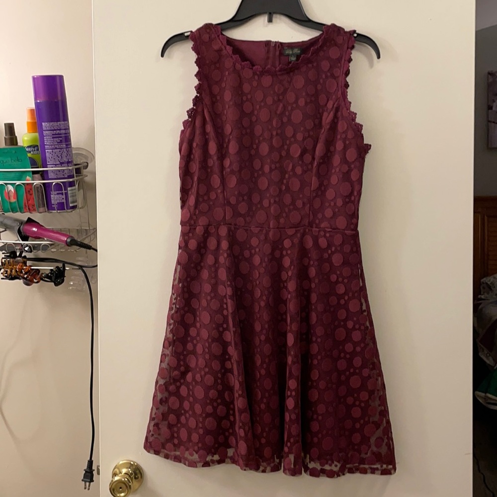 Women’s dress with lace overlay.